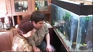 Man forgets about fishes when he fucks the plump mom in incest porn